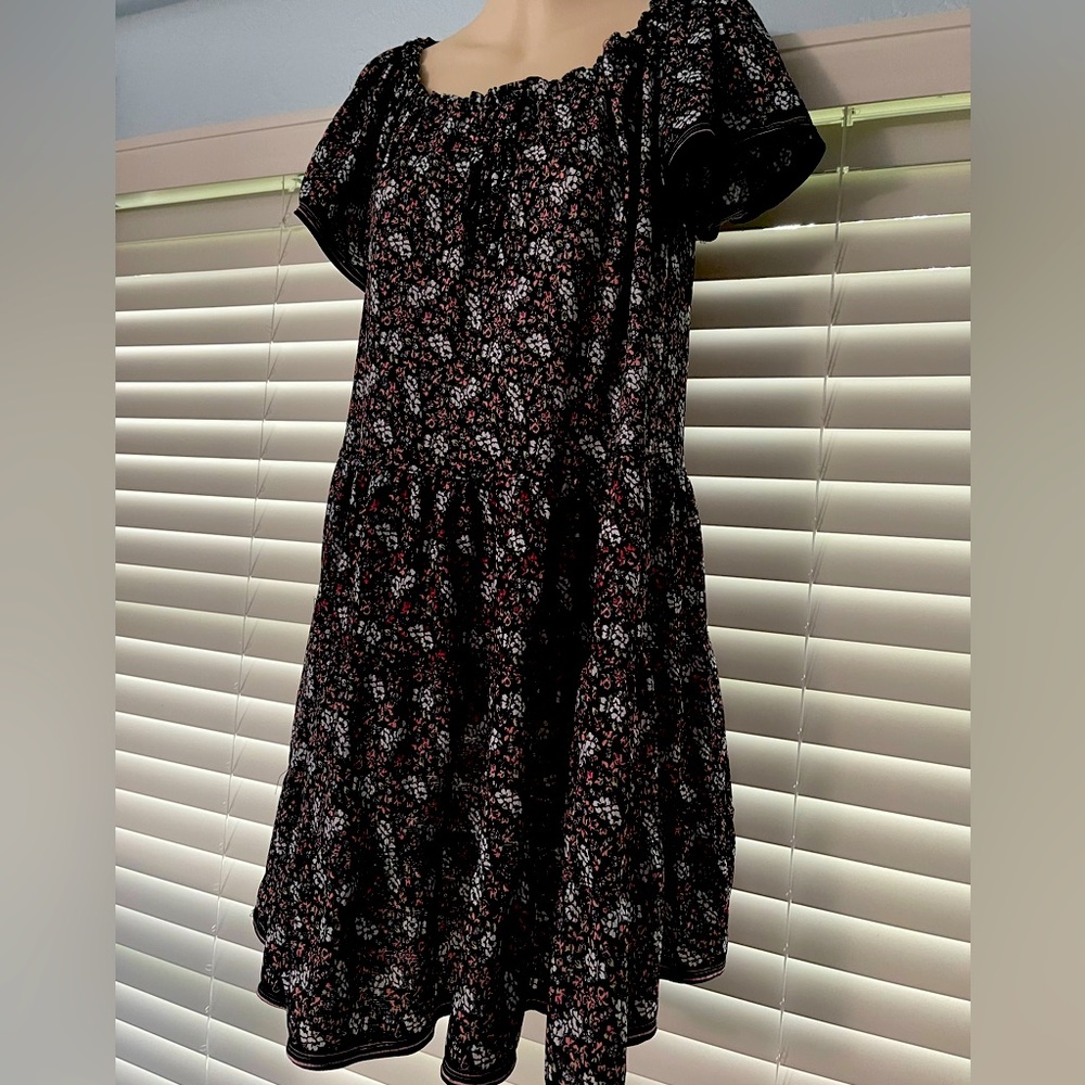 I love this dress, hardly worn. Non smoking, pet free home.